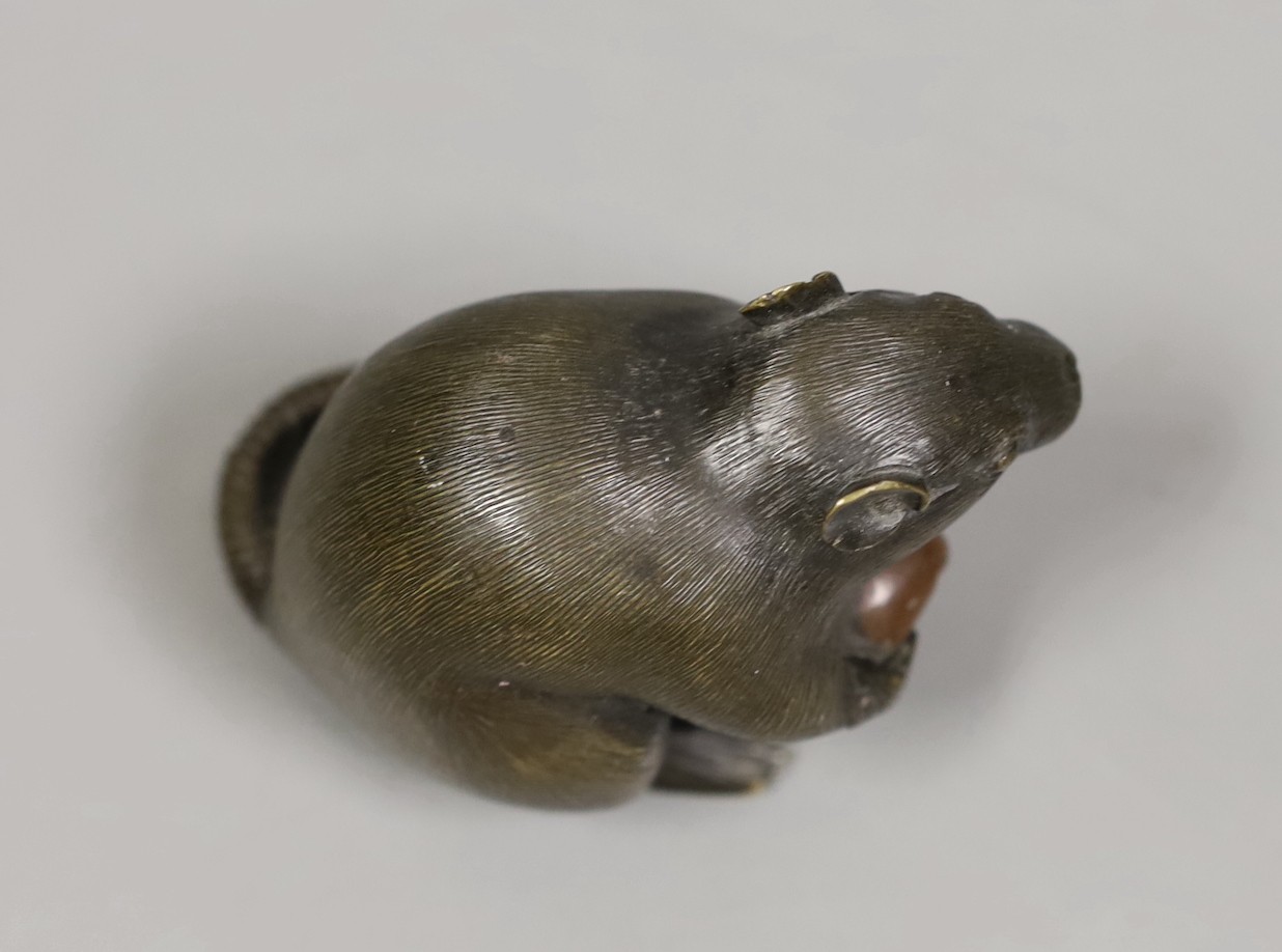 A small Meiji Japanese bonze seated rat with nut, kakihan mark, 7cm tall
